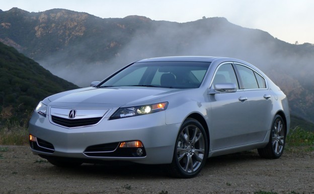 A three-quarter front view of a 2013 Acura TL SH-AWD