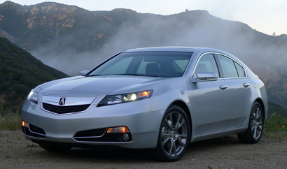 A three-quarter front view of a 2013 Acura TL SH-AWD