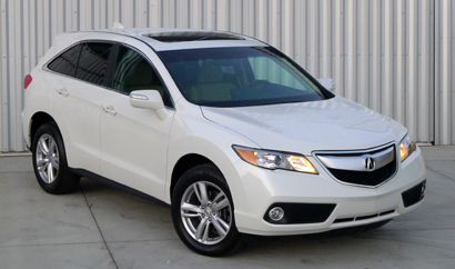 A three-quarter front view of a 2013 Acura RDX AWD Tech