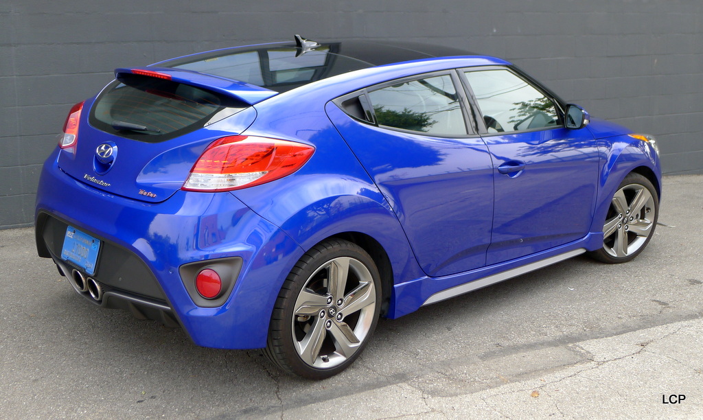 A three-quarter rear view of the 2013 Hyundai Veloster Turbo