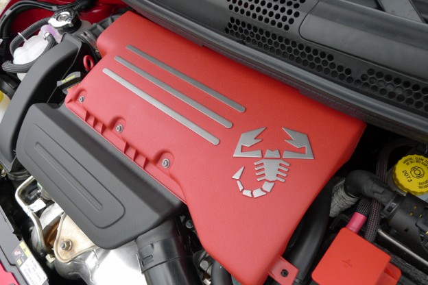 The 1.4-liter turbocharged inline 4-cylinder engine of the 2013 Fiat 500 Abarth Cabrio