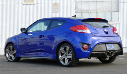 A three-quarter rear view of the 2013 Hyundai Veloster Turbo A/T