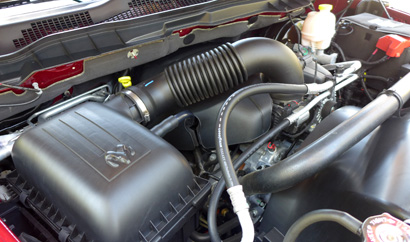 The 5.7-liter V8 HEMI of the 2013 Ram 1500 Outdoorsman Crew Cab 4x4