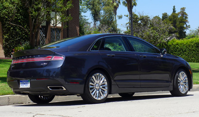 A three-quarter rear view of a 2013 Lincoln MKZ AWD