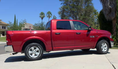 A side view of the 2013 Ram 1500 Outdoorsman Crew Cab 4x4