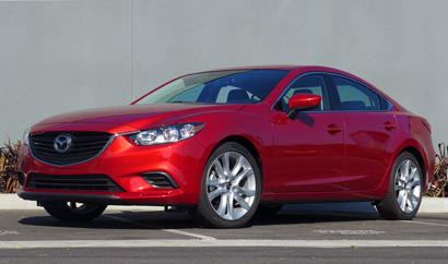 A three-quarter front view of the 2014 Mazda 6 Touring