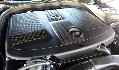 The 2.1-liter twin-turbocharged inline-4 diesel engine of the 2014 Mercedes-Benz E250 BlueTEC 4MATIC