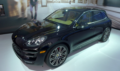 A three-quarter front view of the 2015 Porsche Macan at the 2013 Los Angeles Auto Show