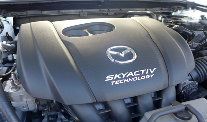 The SKYACTIV-G 2.0-liter 4-cylinder of the 2014 Mazda 3 i 4-Door Touring