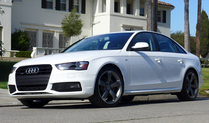 A three-quarter front view of the 2014 Audi A4 2.0T quattro manual