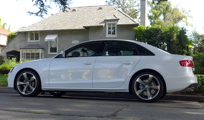 A side view of the 2014 Audi A4 2.0T quattro manual