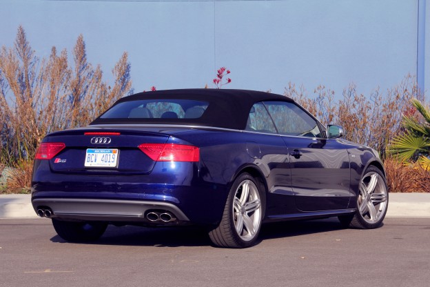 A three-quarter rear view of the 2014 Audi S5 Cabriolet with the top up