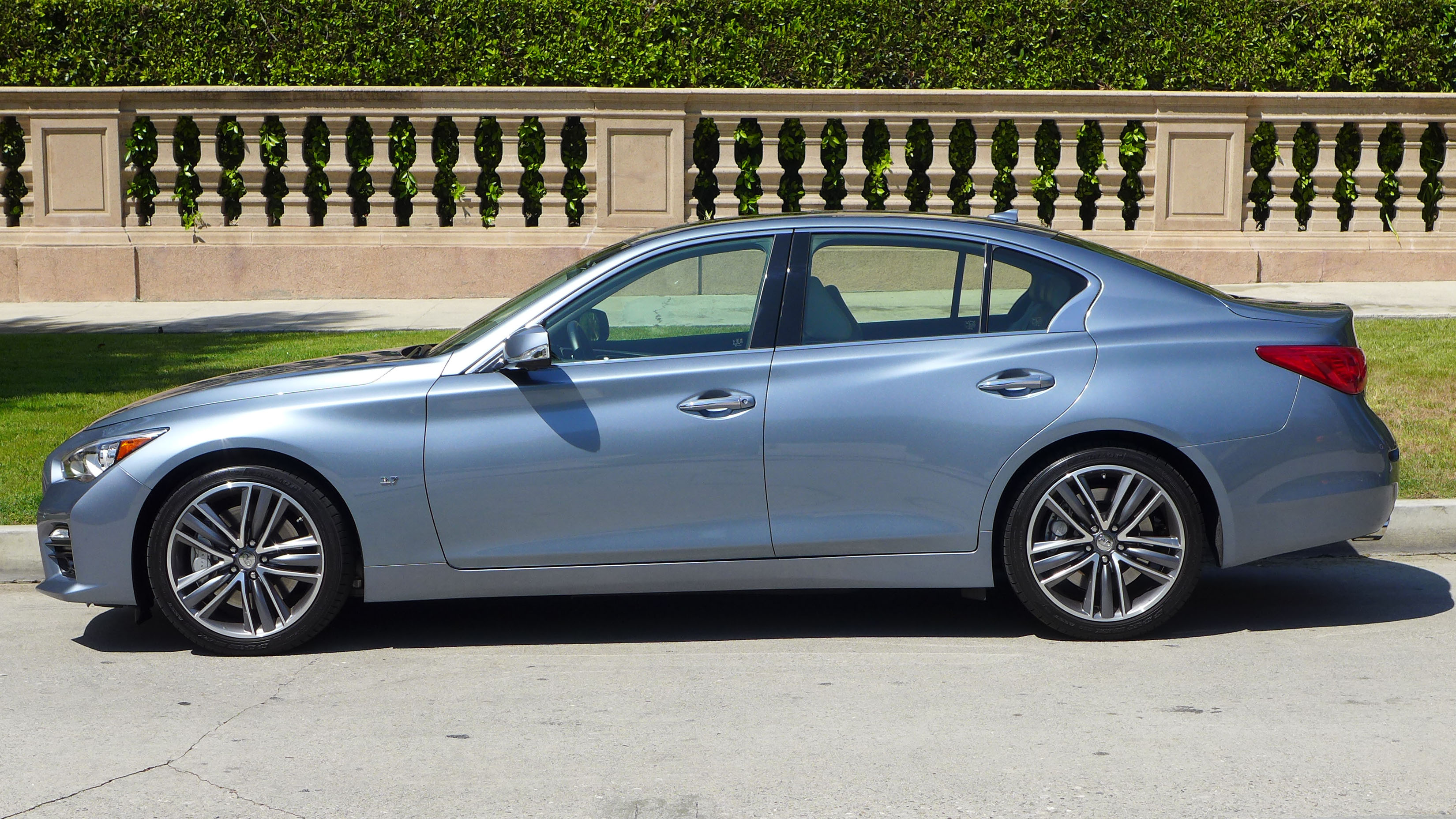 Infiniti Q50s 3.7 profile with sharp creases, flared haunches