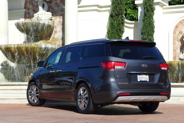 2015 Kia Sedona rear three quarter view