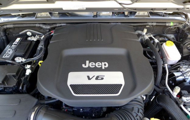 The 3.6-liter V6 24-valve engine in the 2015 Jeep Wrangler Willys Wheeler