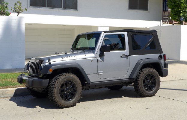 A three-quarter front view of the 2015 Jeep Wrangler Willys Wheeler