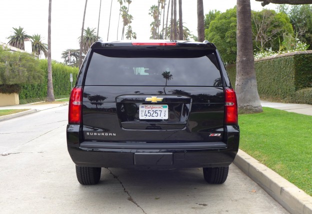 A back view of the 2015 Chevrolet Suburban 4WD 1/2 Ton LT