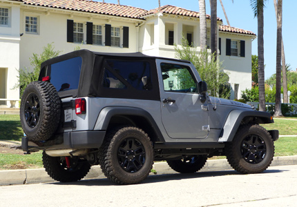 A three-quarter rear view of the 2015 Jeep Wrangler Willys Wheeler