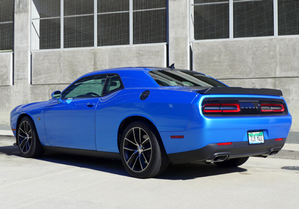 A three quarters back view of the 2015 Dodge Challenger SPS