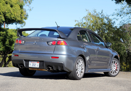 A three-quarter rear view of the 2015 Mitsubishi Lancer Evolution GSR