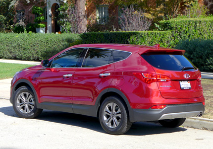 A three-quarter rear view of the 2016 Hyundai Santa Fe Sport FWD 2.4