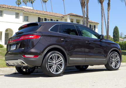 A three-quarter rear view of the 2015 Lincoln MKC Black Label AWD