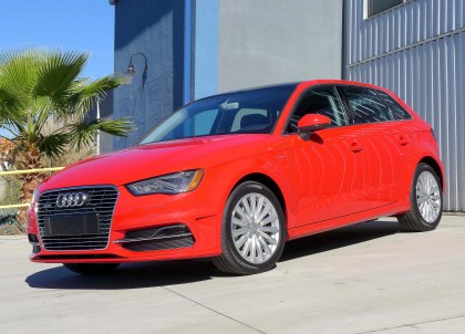 A three-quarter front view of the 2016 Audi A3 e-tron in misano red