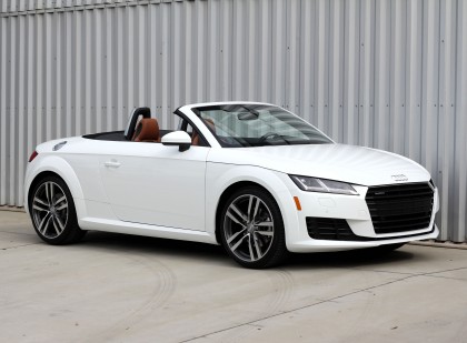 A three-quarter front view of a 2016 Audi TT Roadster 2.0T quattro S tronic shown in Ibis White