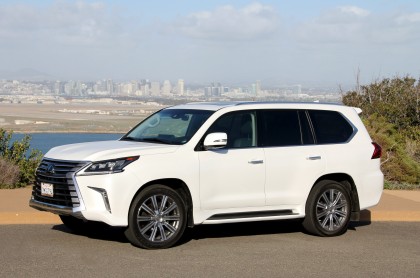 A three-quarter front view of a 2016 Lexus LX570 5-Door SUV shown in Starfire Pearl